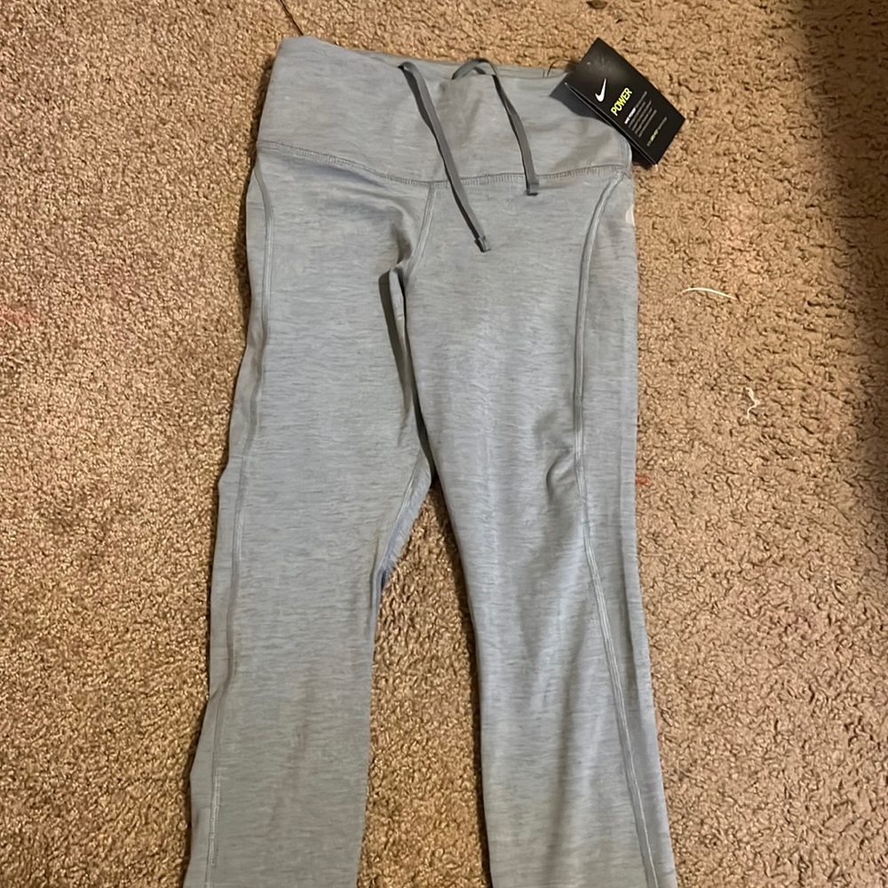 Grey Nike DRI-FIT running pants